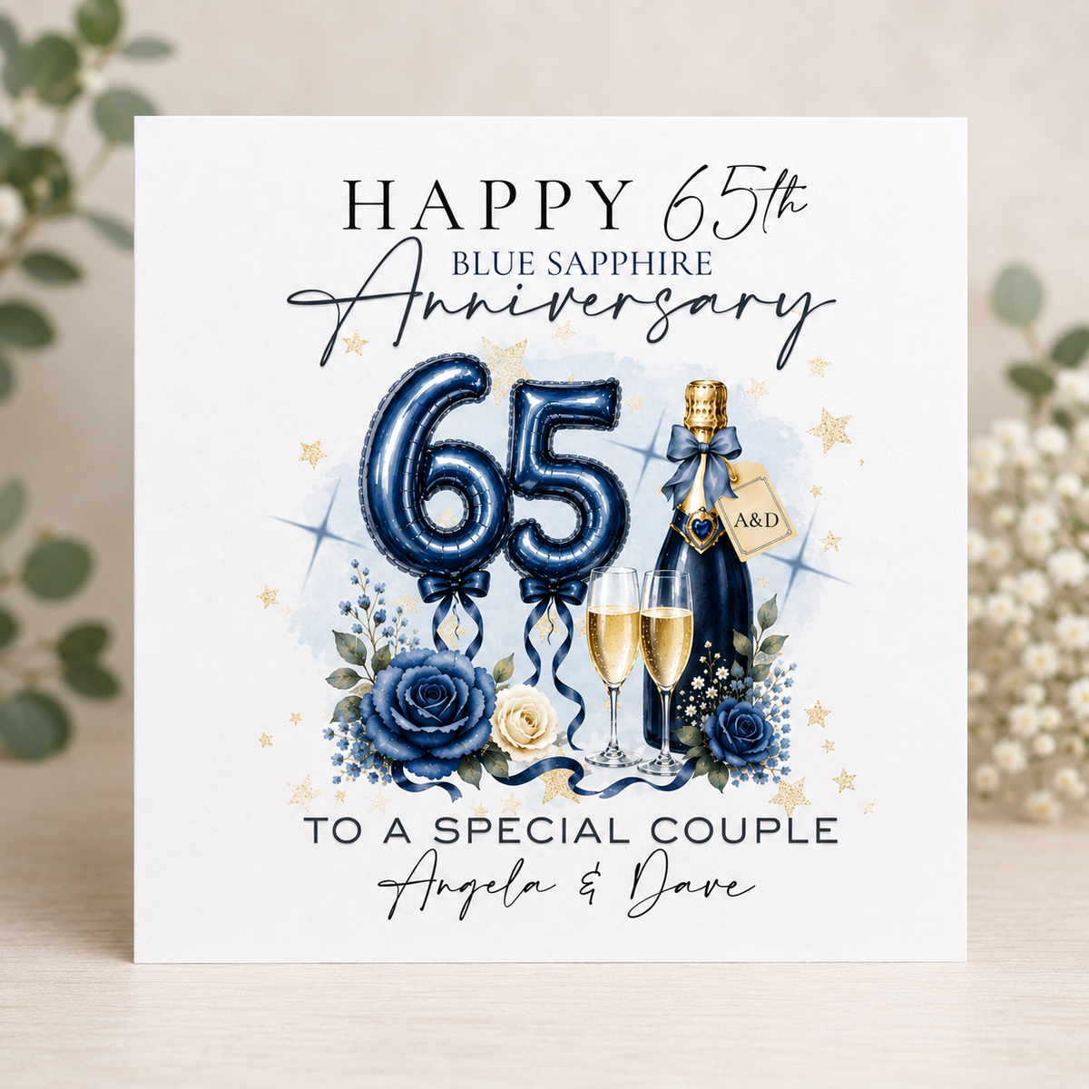 Personalised 65th wedding anniversary Blue Sapphire card with champagne, blue roses and heart balloons