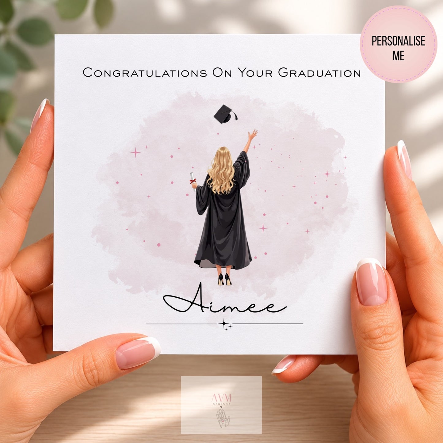 Personalised graduation card featuring female graduate in cap and gown