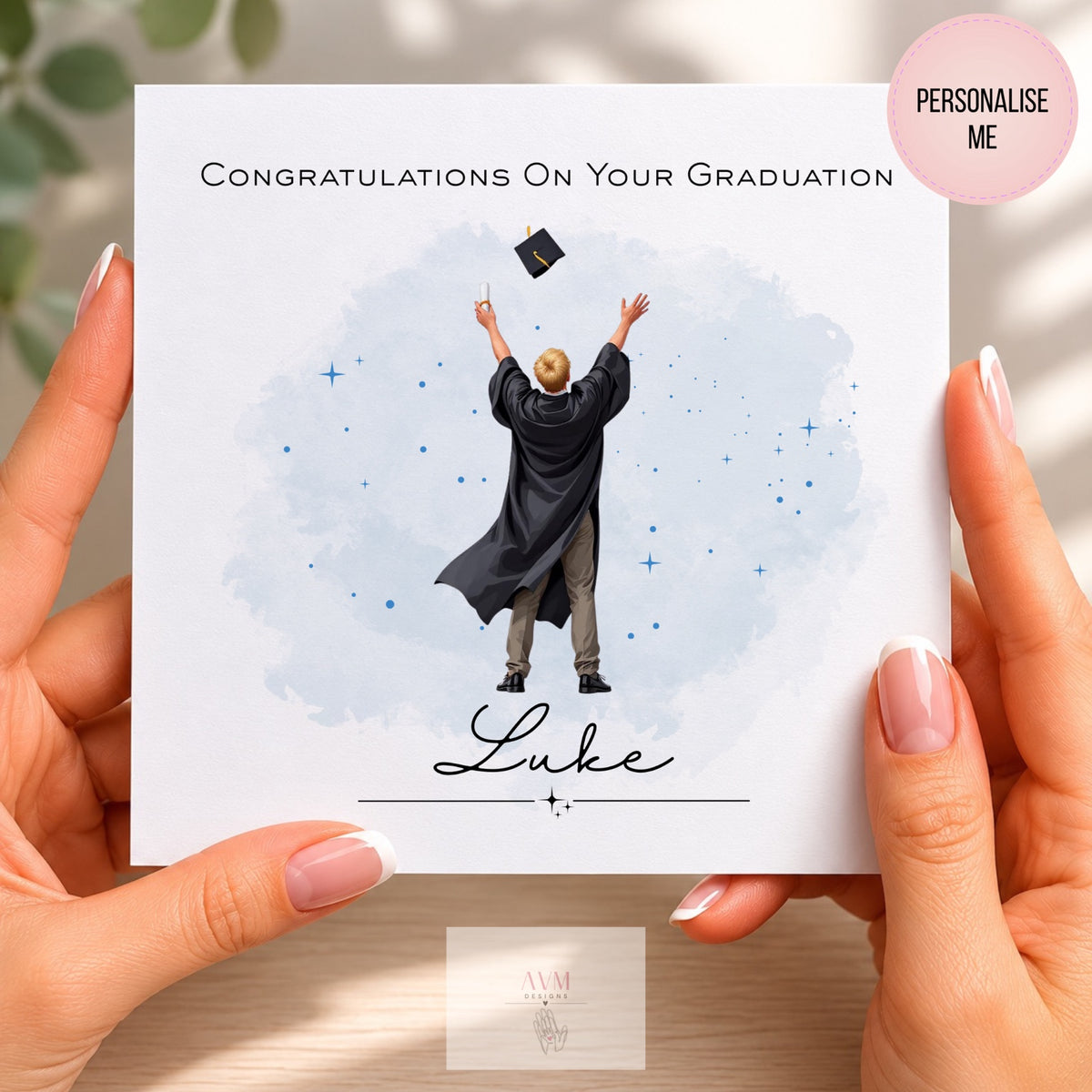 Personalised graduation card featuring graduate in cap and gown